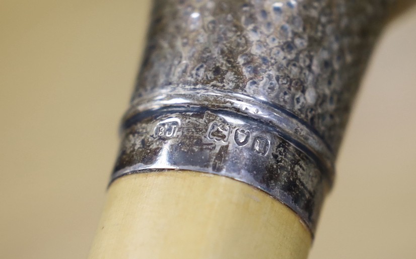 A silver mounted malacca walking cane together with a 19th century French bayonet